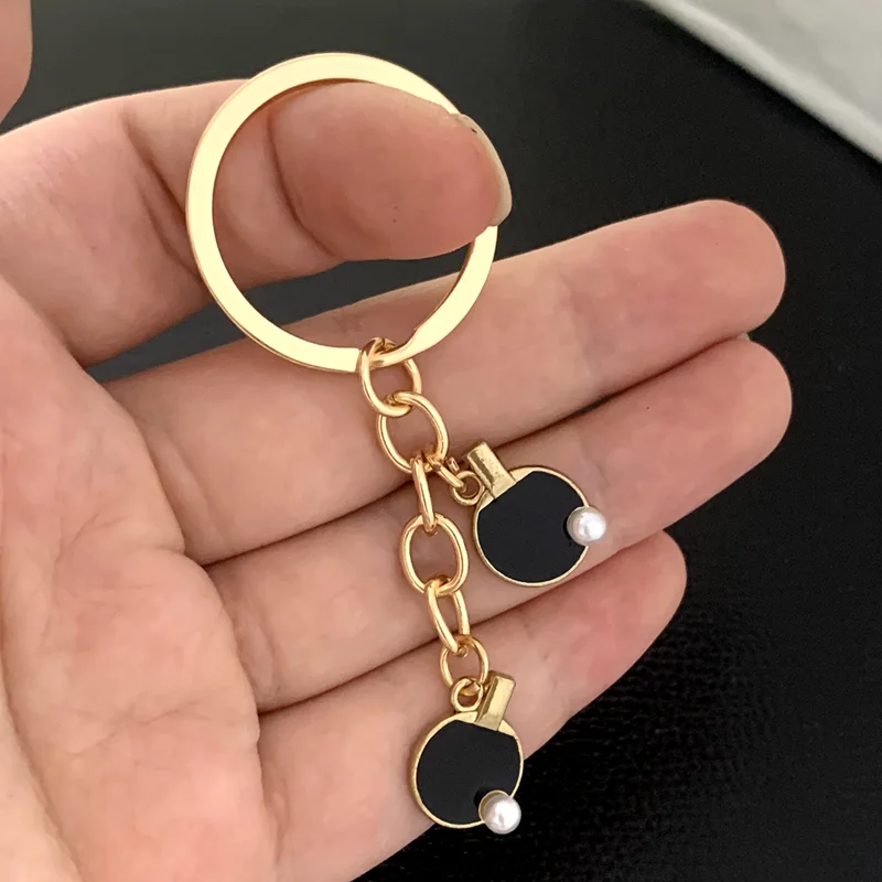 Black Red sports table tennis  - đánh giá và giá Table Tennis Keychain