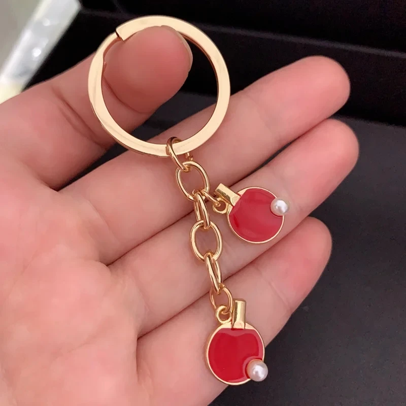 Black Red sports table tennis  - đánh giá và giá Table Tennis Keychain